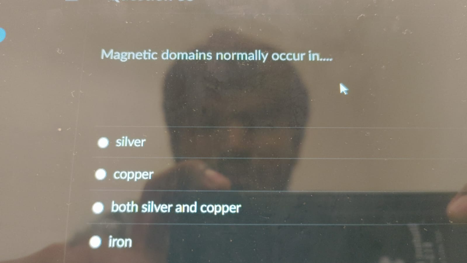 Magnetic domains normally occur in . . . .