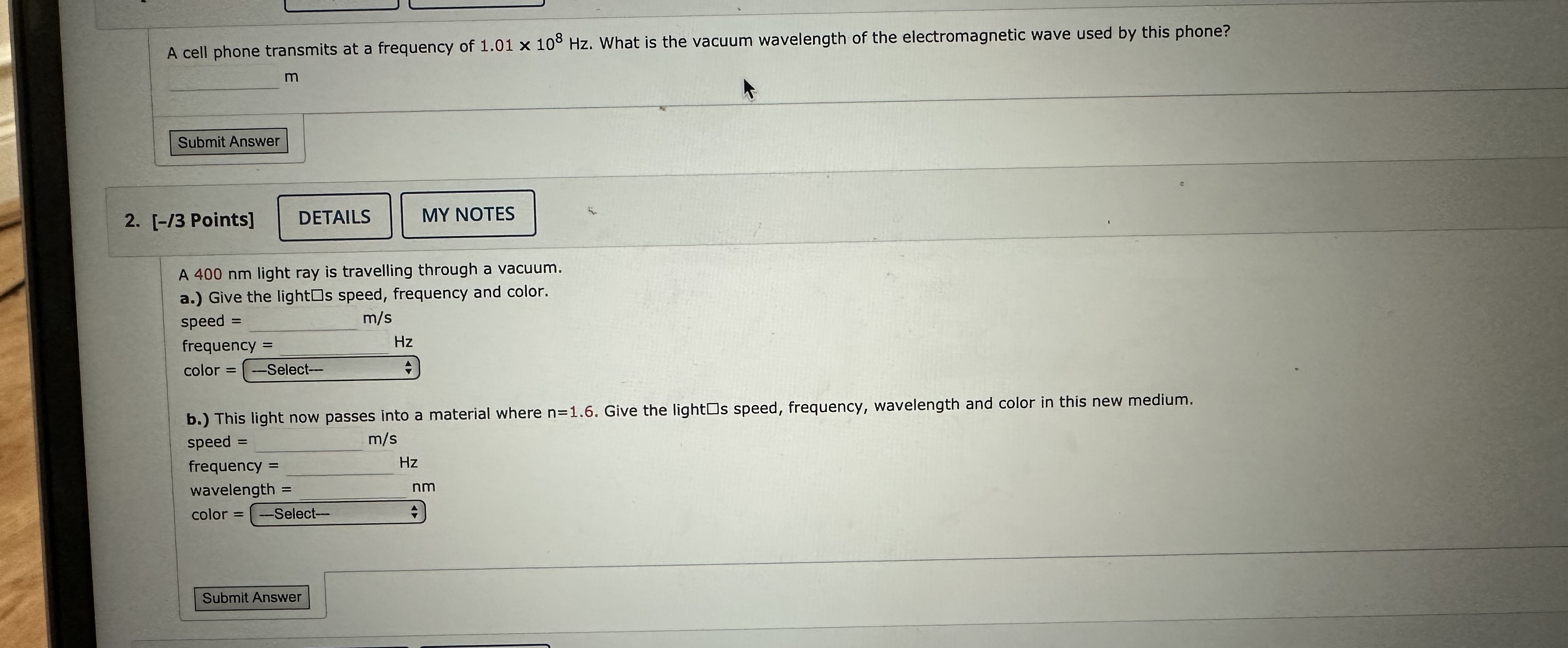 A cell phone transmits at a frequency of 1 . 0 1
