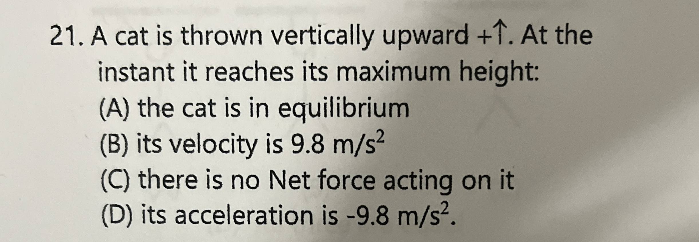 A cat is thrown vertically upward + uarr. At the