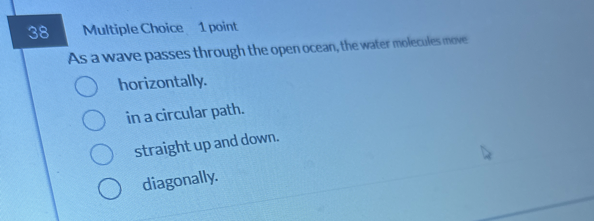 As a wave passes through the open ocean, the