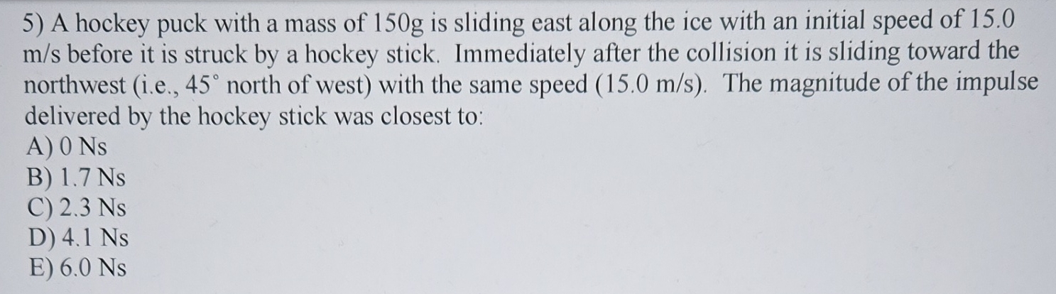 A hockey puck with a mass of 1 5 0 g is sliding