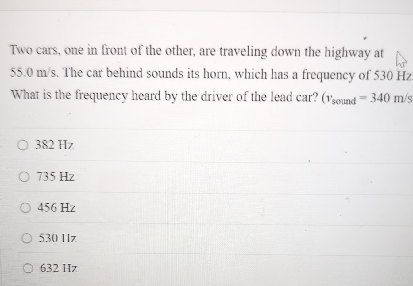 Two cars, one in front of the other, are