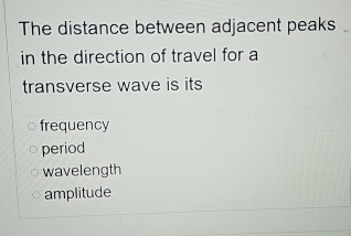The distance between adjacent peaks in the