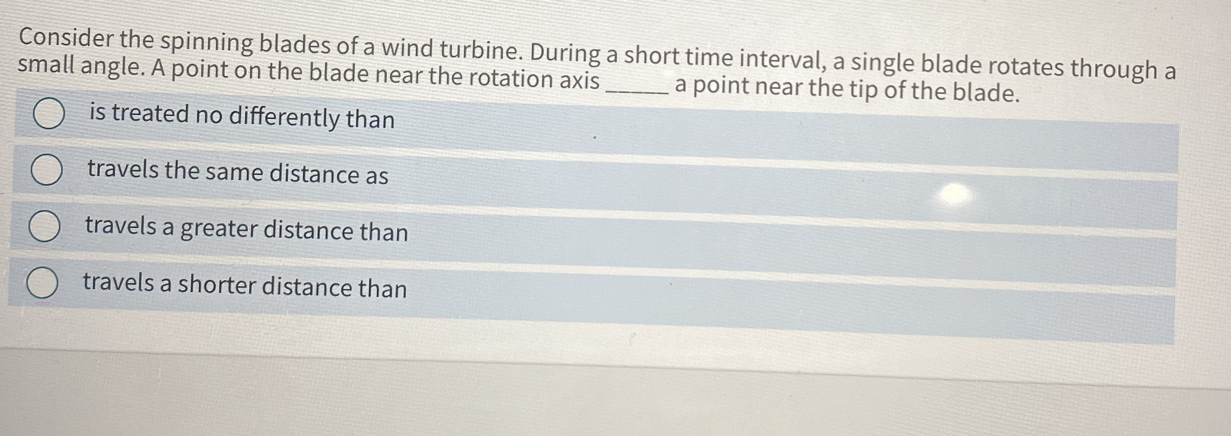 Consider the spinning blades of a wind turbine.