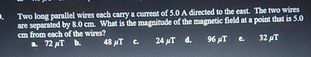 Two long parallel wires each carry a current of 5