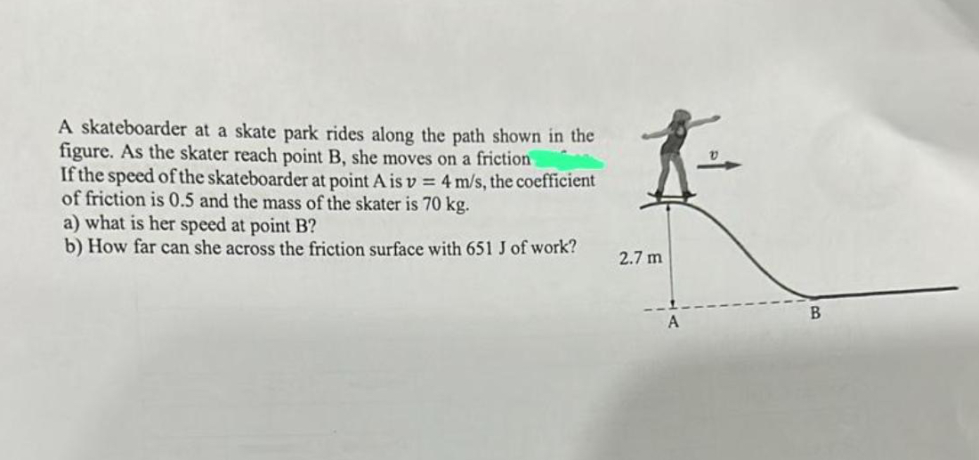 A skateboarder at a skate park rides along the