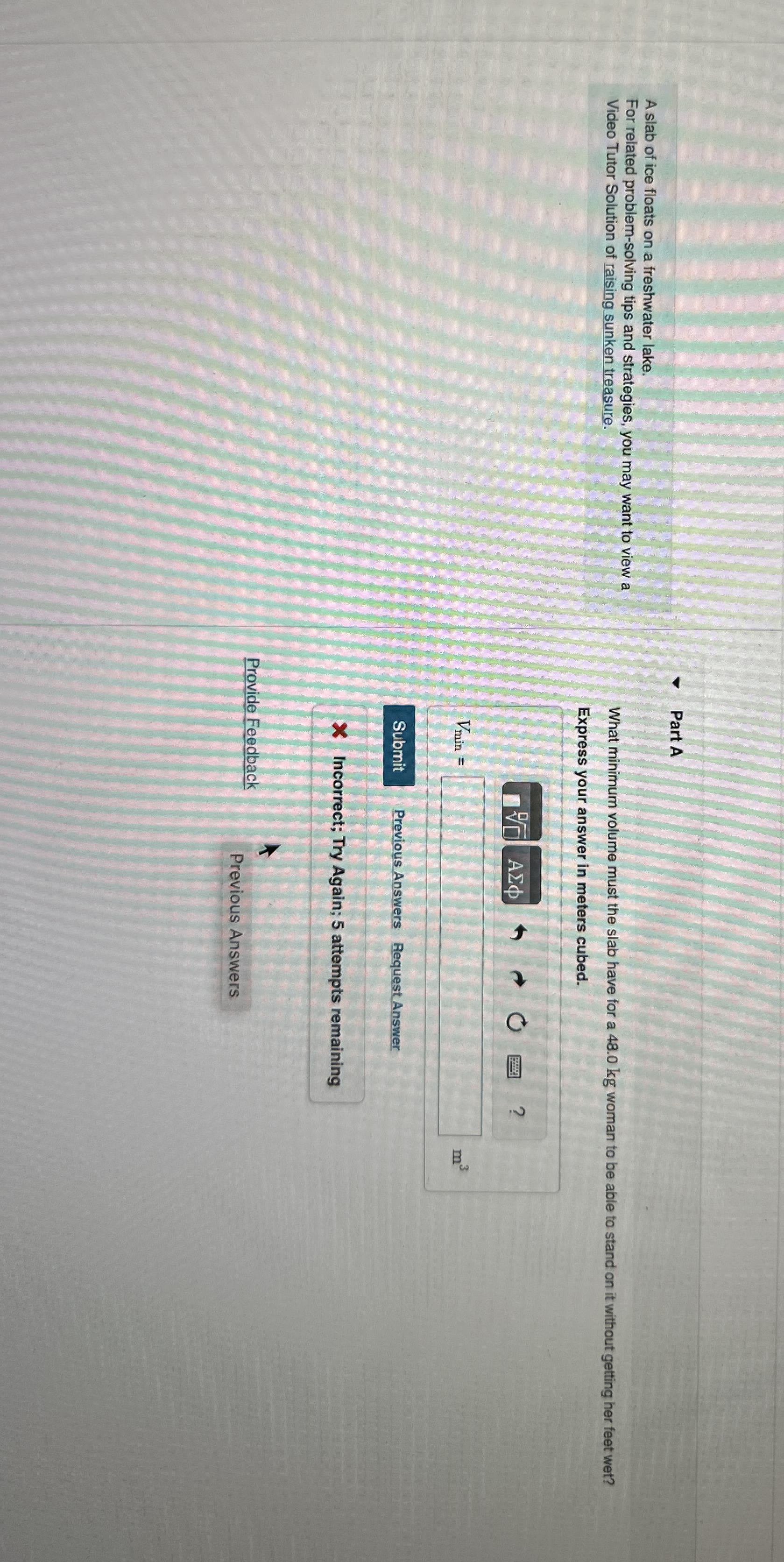 A slab of ice floats on a freshwater lake. For