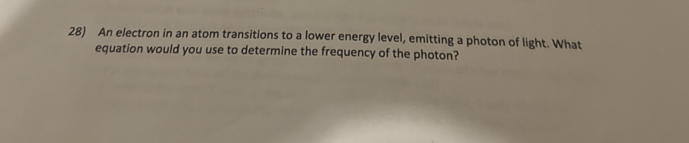 An electron in an atom transitions to a lower