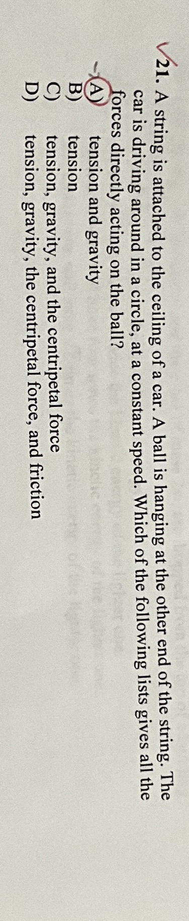 A string is attached to the ceiling of a car. A
