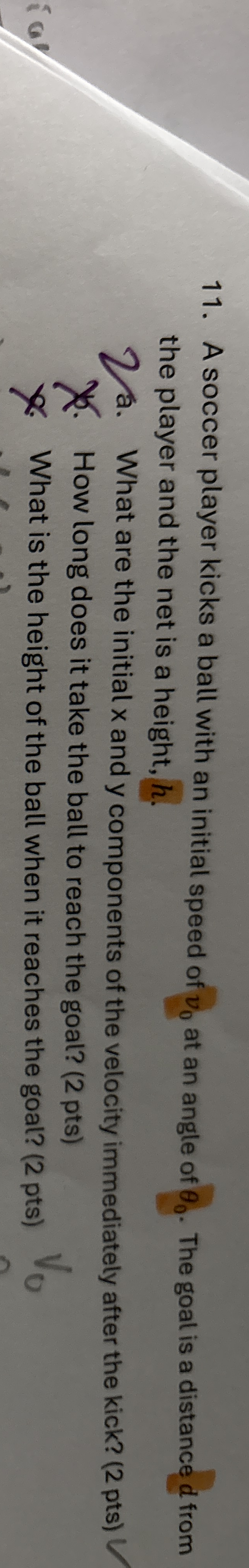 A soccer player kicks a ball with an initial