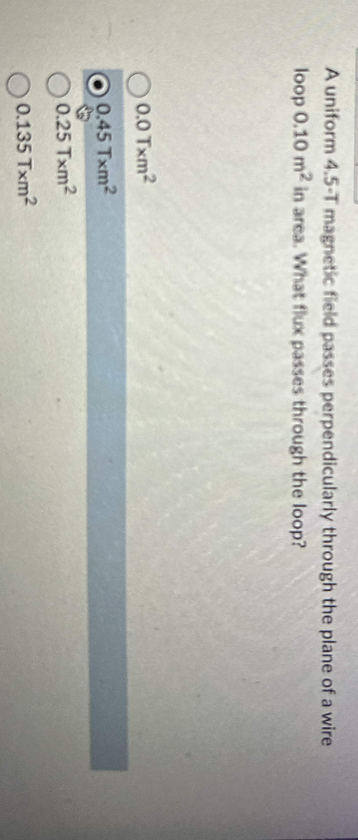 A uniform 4 . 5 - T magnetic field passes