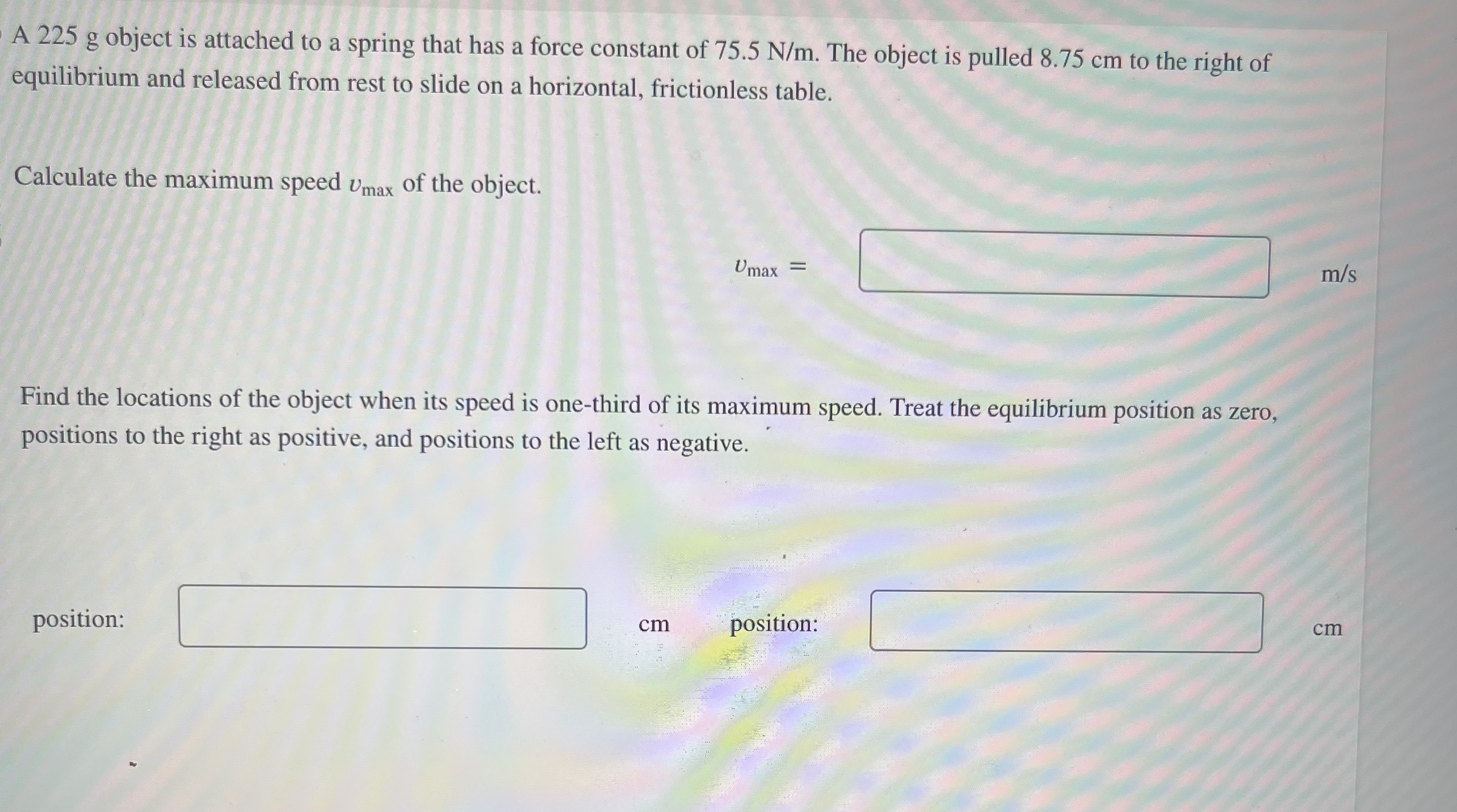 A 2 2 5 g object is attached to a spring that has