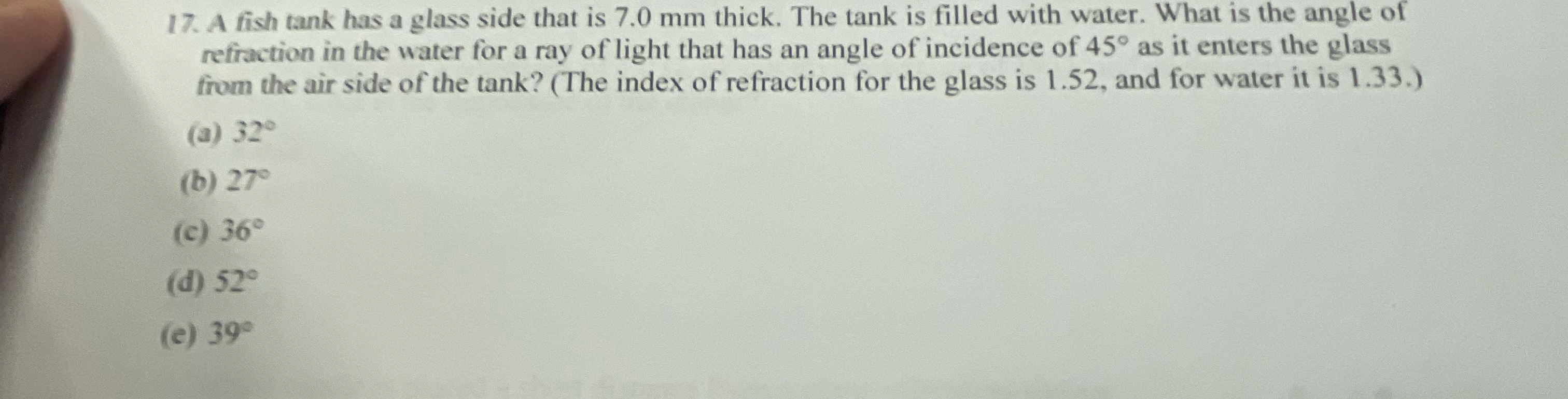A fish tank has a glass side that is 7 . 0 mm