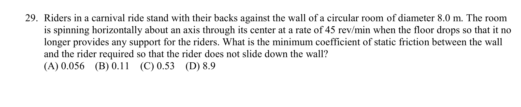 Riders in a carnival ride stand with their backs