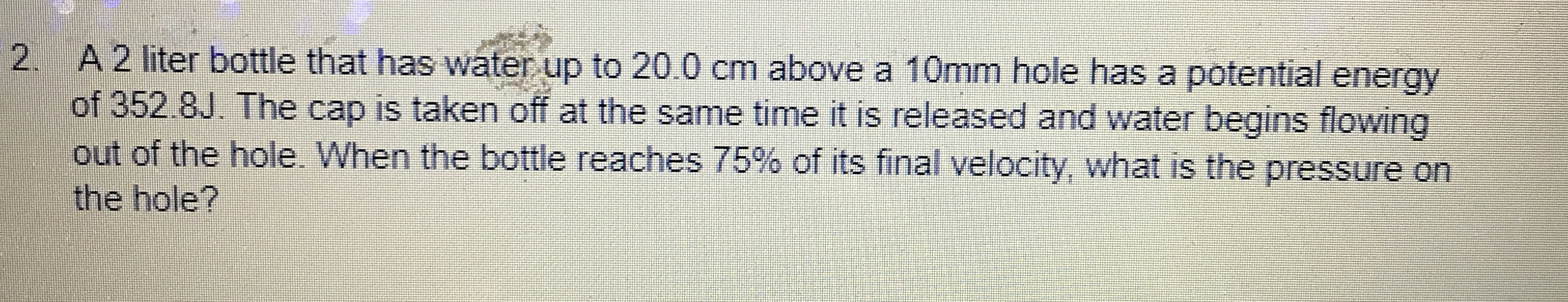A 2 liter bottle that has water up to 2 0 . 0 cm