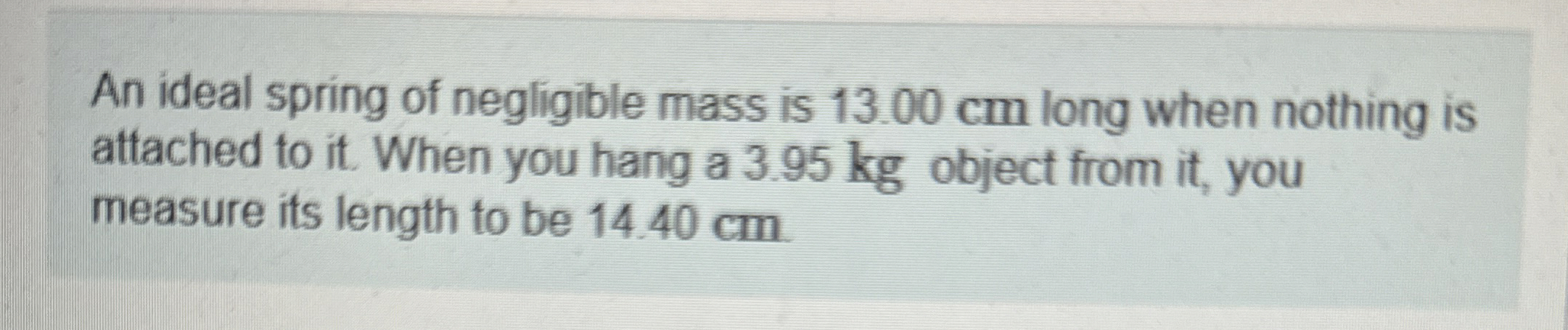 An ideal spring of negligible mass is 1 3 . 0 0