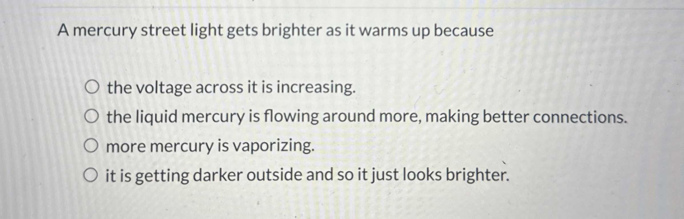 A mercury street light gets brighter as it warms