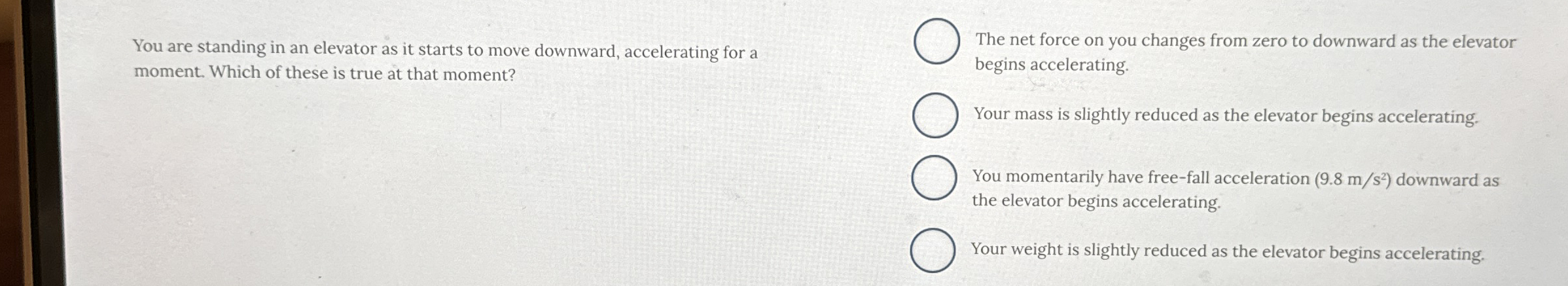 You are standing in an elevator as it starts to