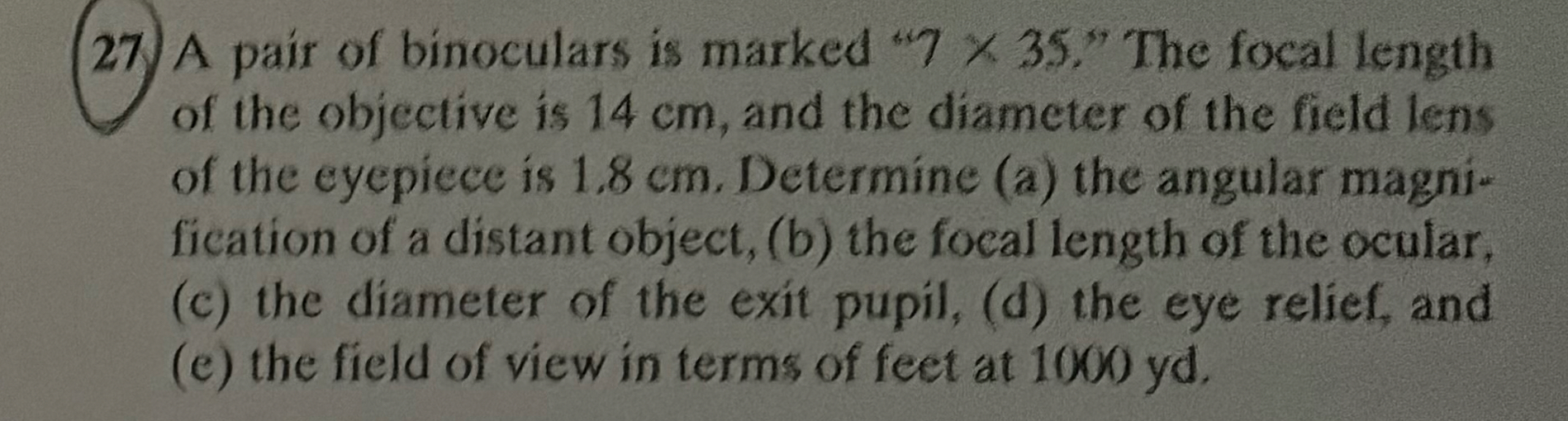 A pair of binoculars is marked " 7 3 5 . " The
