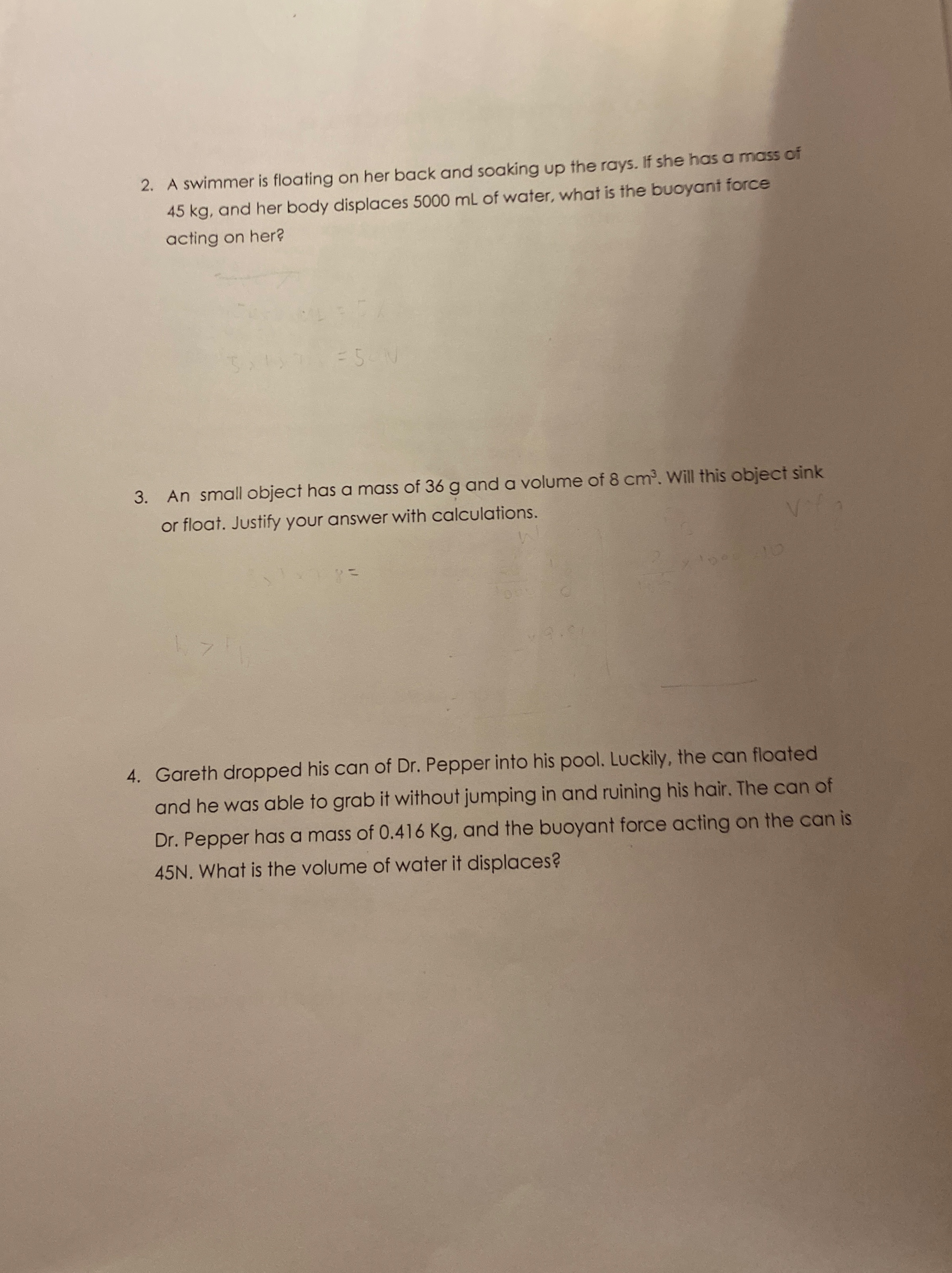 A swimmer is floating on her back and soaking up