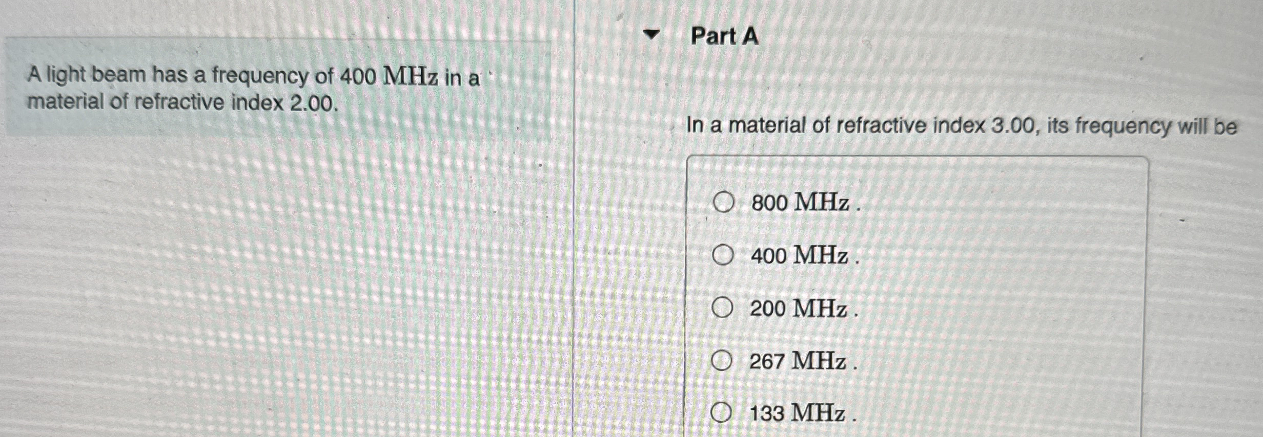 A light beam has a frequency of 4 0 0 MHz in a