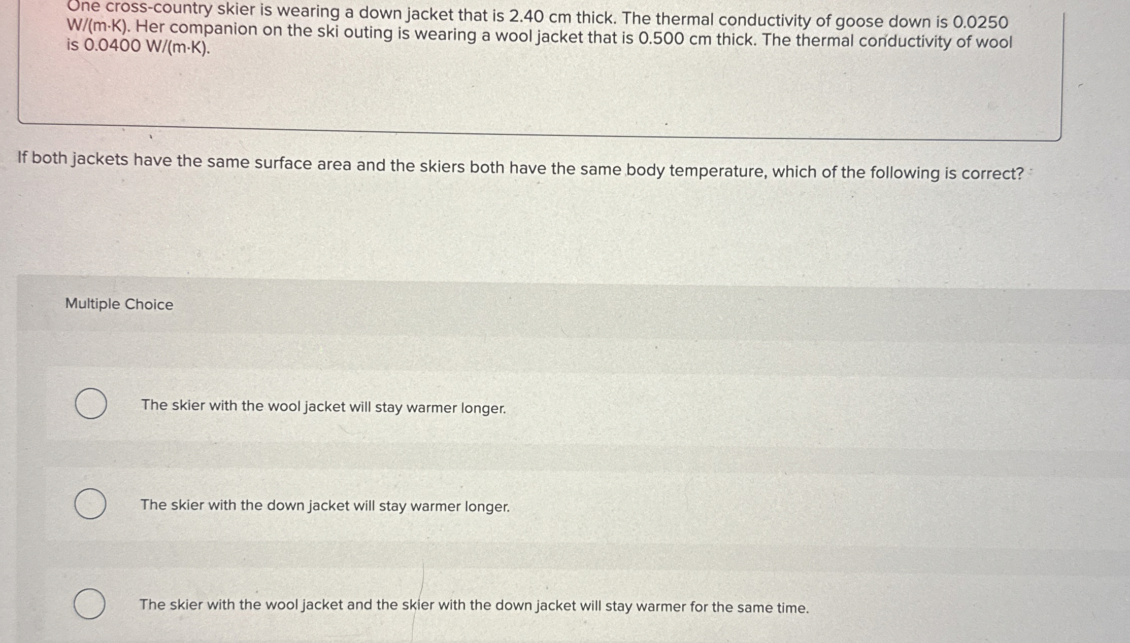 One cross - country skier is wearing a down