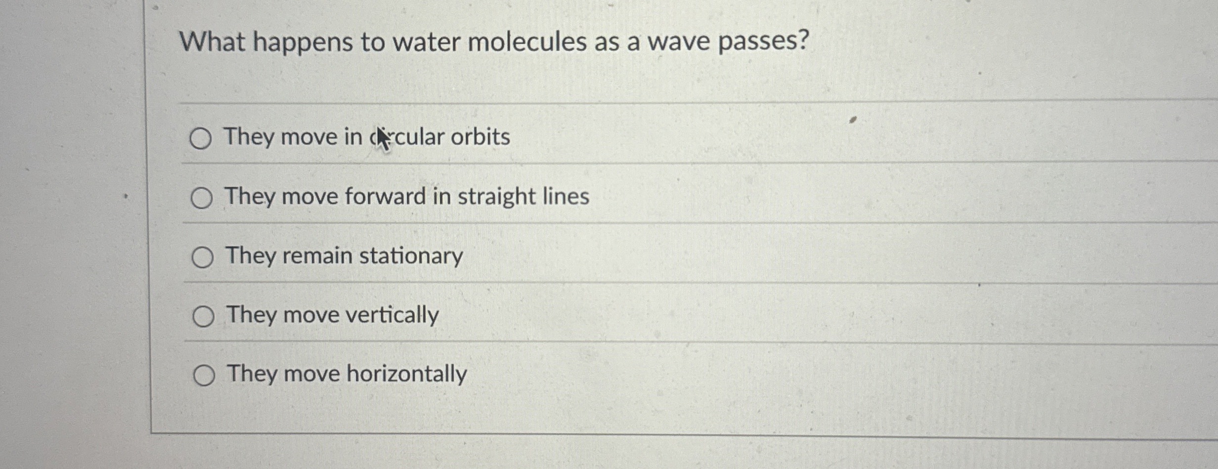 What happens to water molecules as a wave passes?