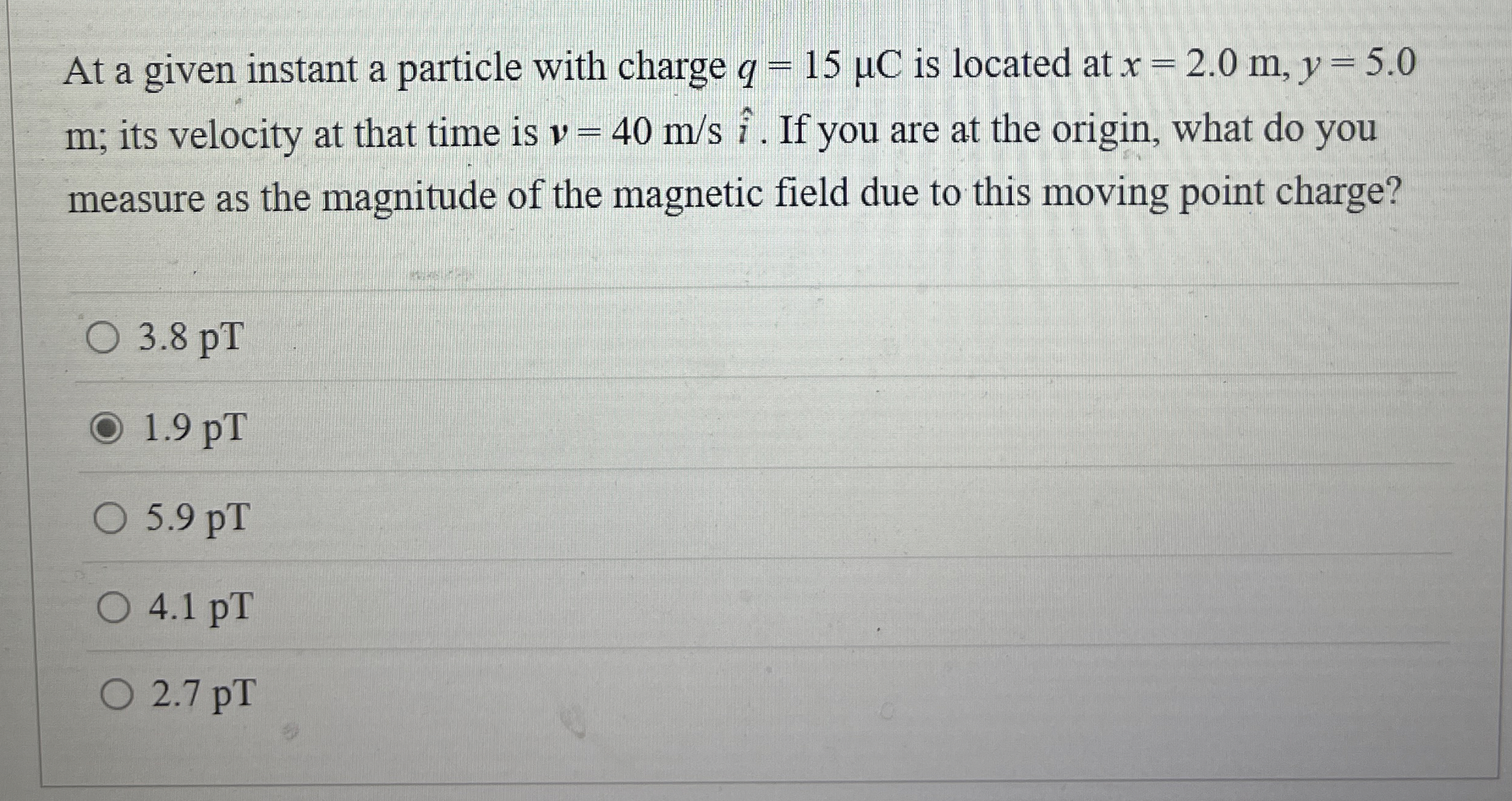 At a given instant a particle with charge q = 1 5