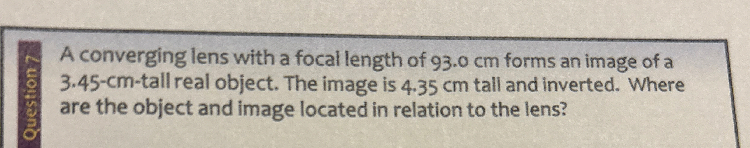 A converging lens with a focal length of 9 3 . 0