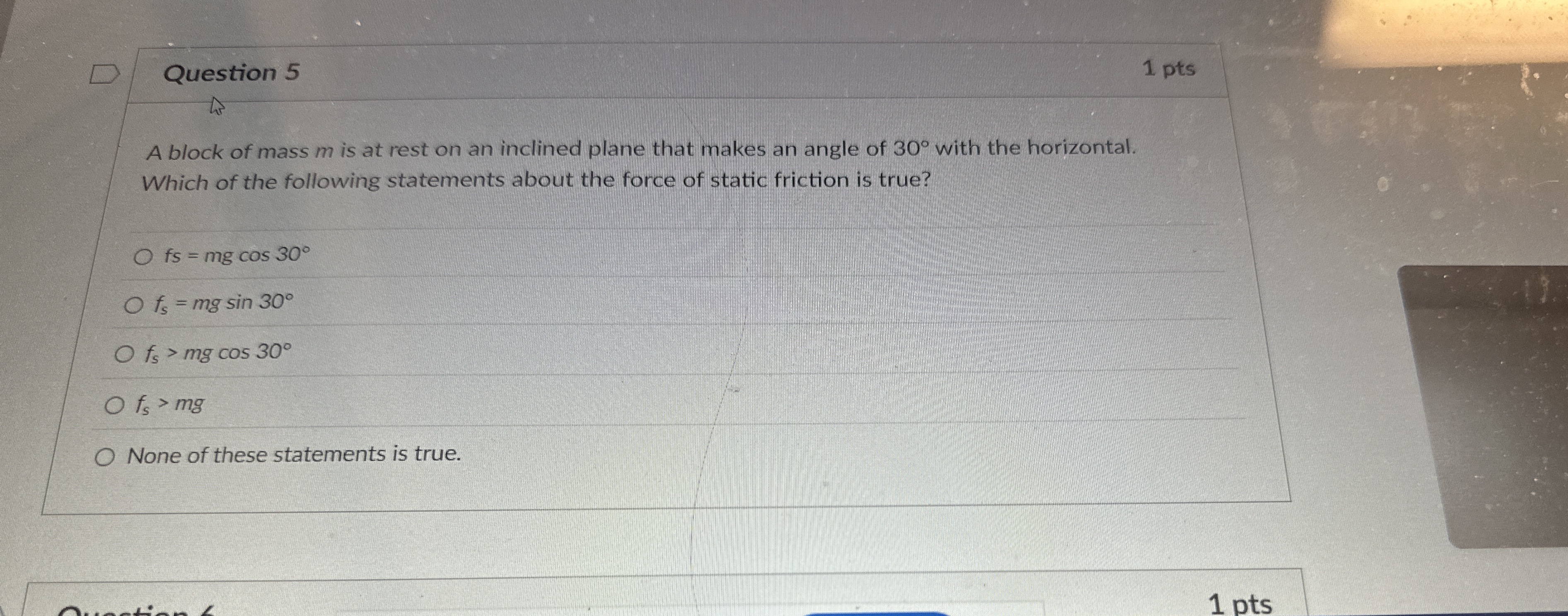 Question 5 1 pts A block of mass m is at rest on
