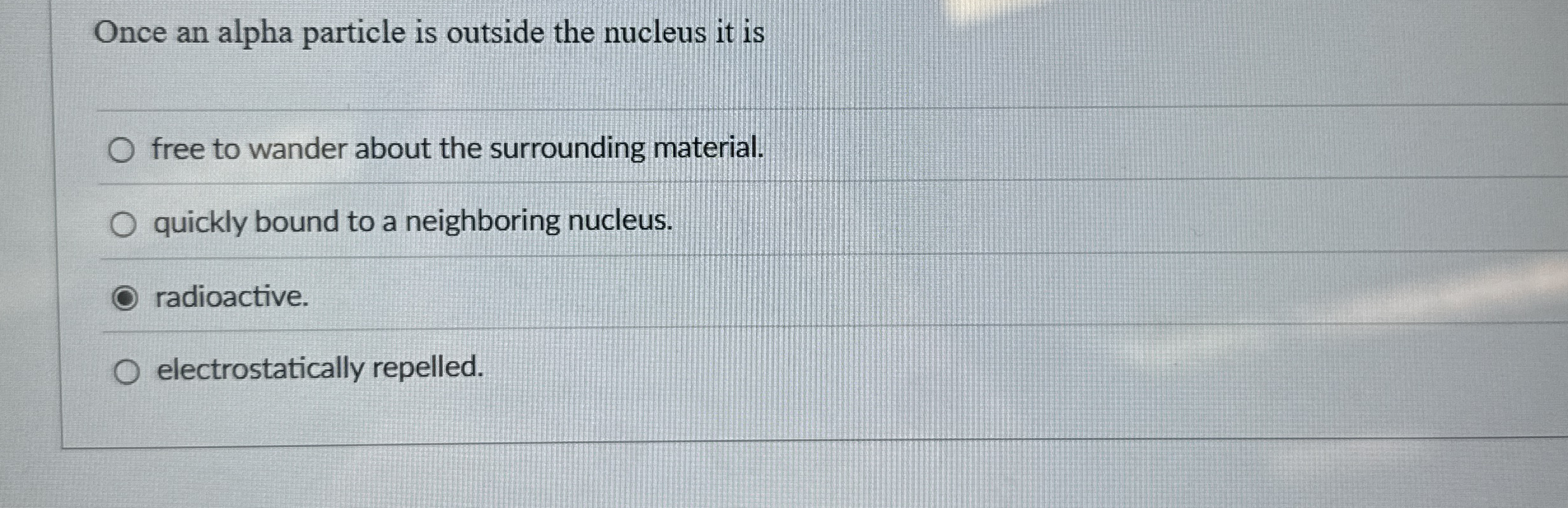 Once an alpha particle is outside the nucleus it