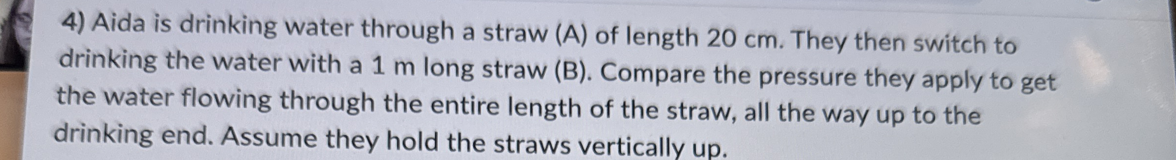 Aida is drinking water through a straw ( A ) of