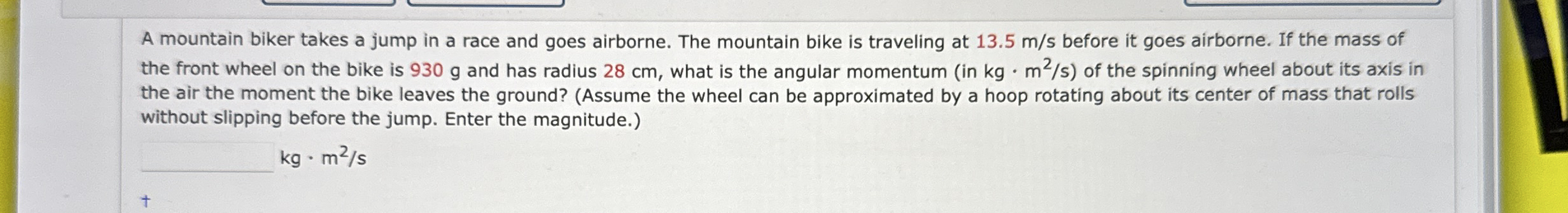 A mountain biker takes a jump in a race and goes