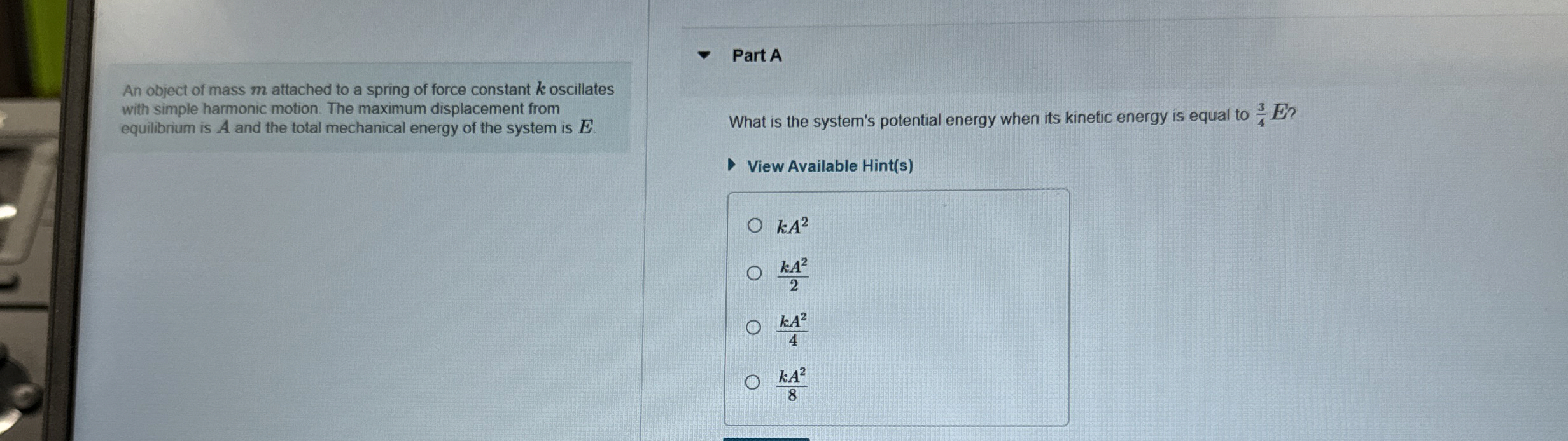 An object of mass m attached to a spring of force