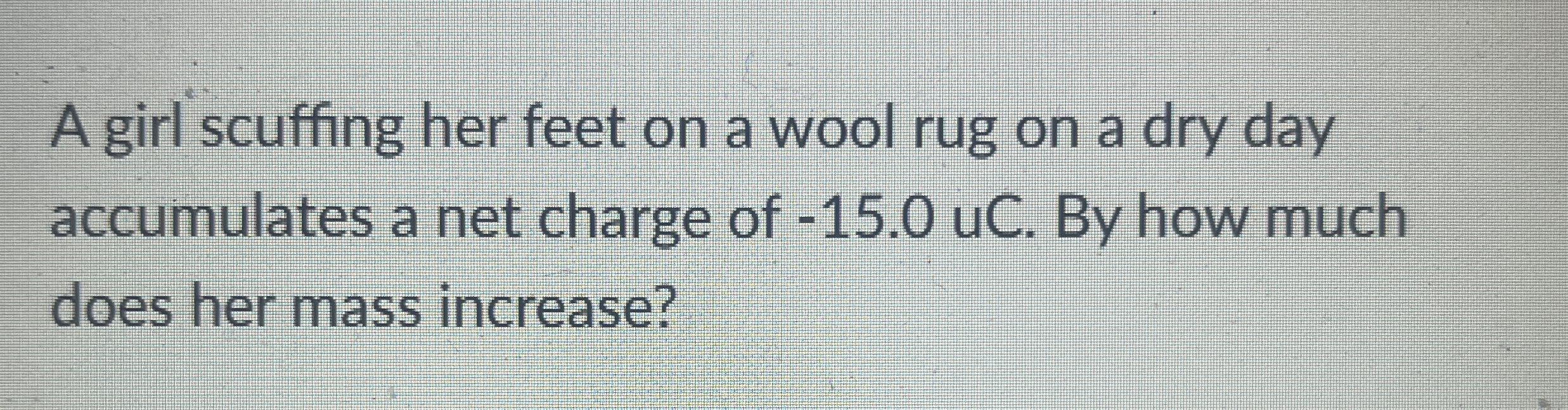 A girl scuffing her feet on a wool rug on a dry