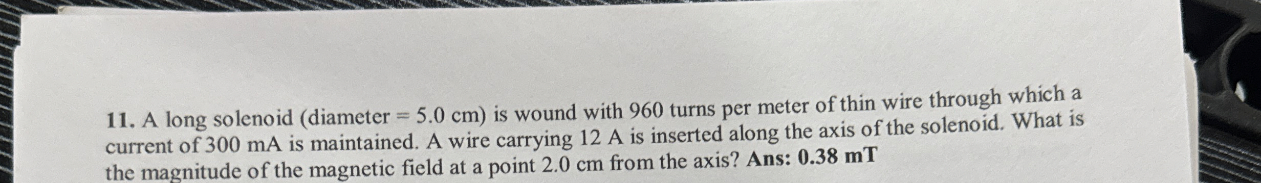 A long solenoid ( diameter = 5 . 0 c m ) is wound