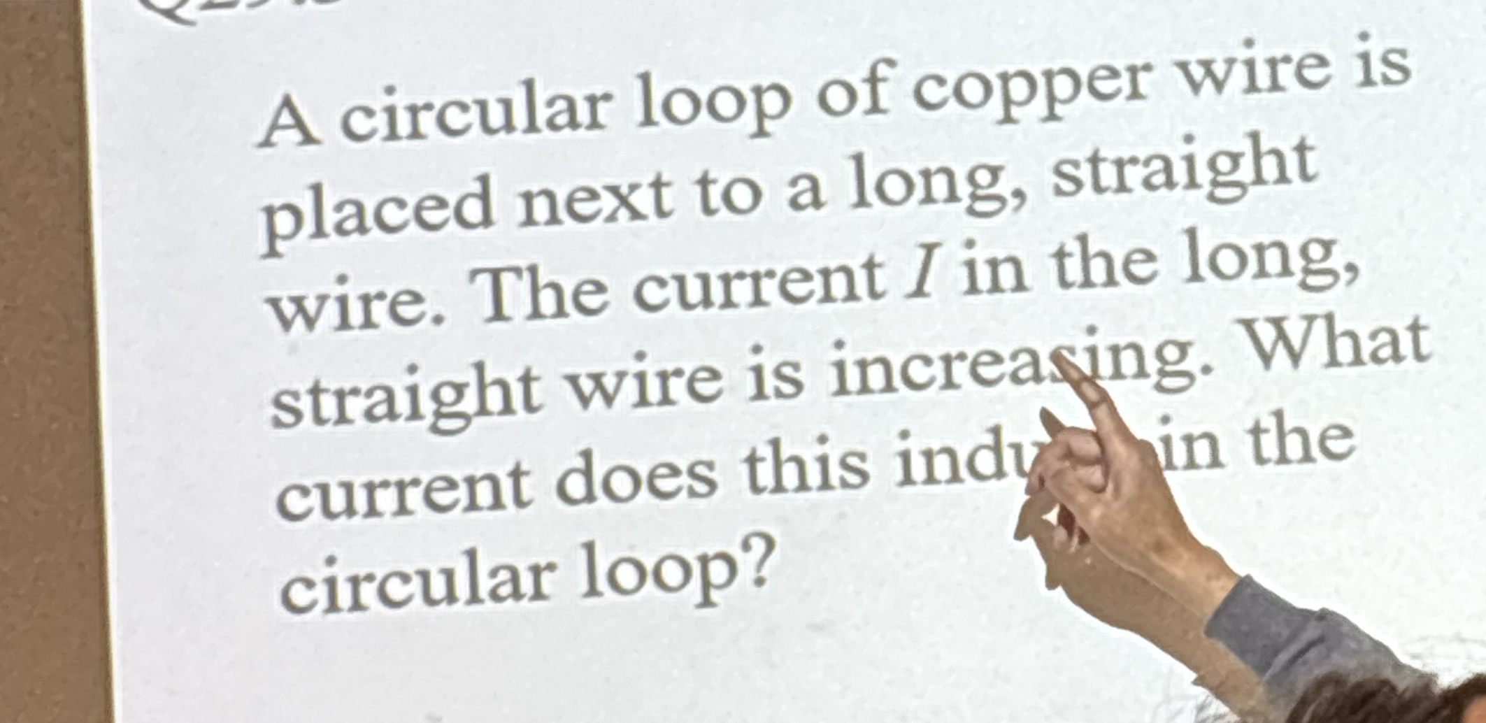 A circular loop of copper wire is placed next to