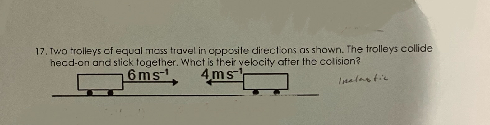 Two trolleys of equal mass travel in opposite