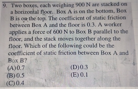 Two boxes, each weighing 9 0 0 N are stacked on a