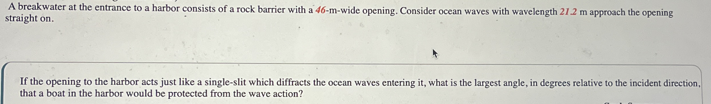 A breakwater at the entrance to a harbor consists