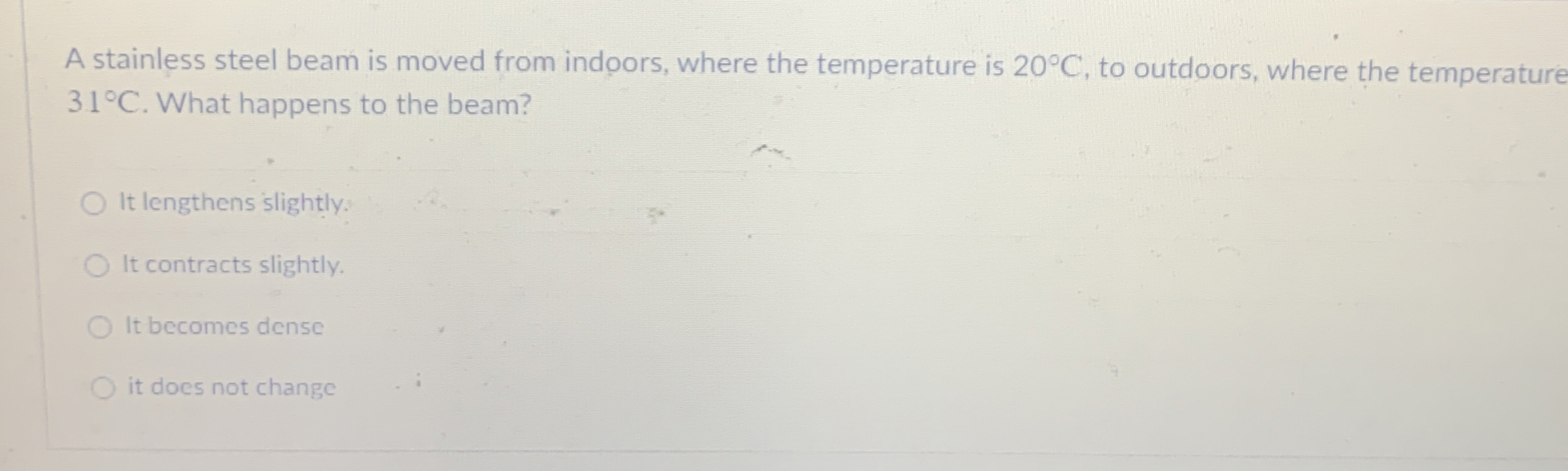 A stainless steel beam is moved from indoors,