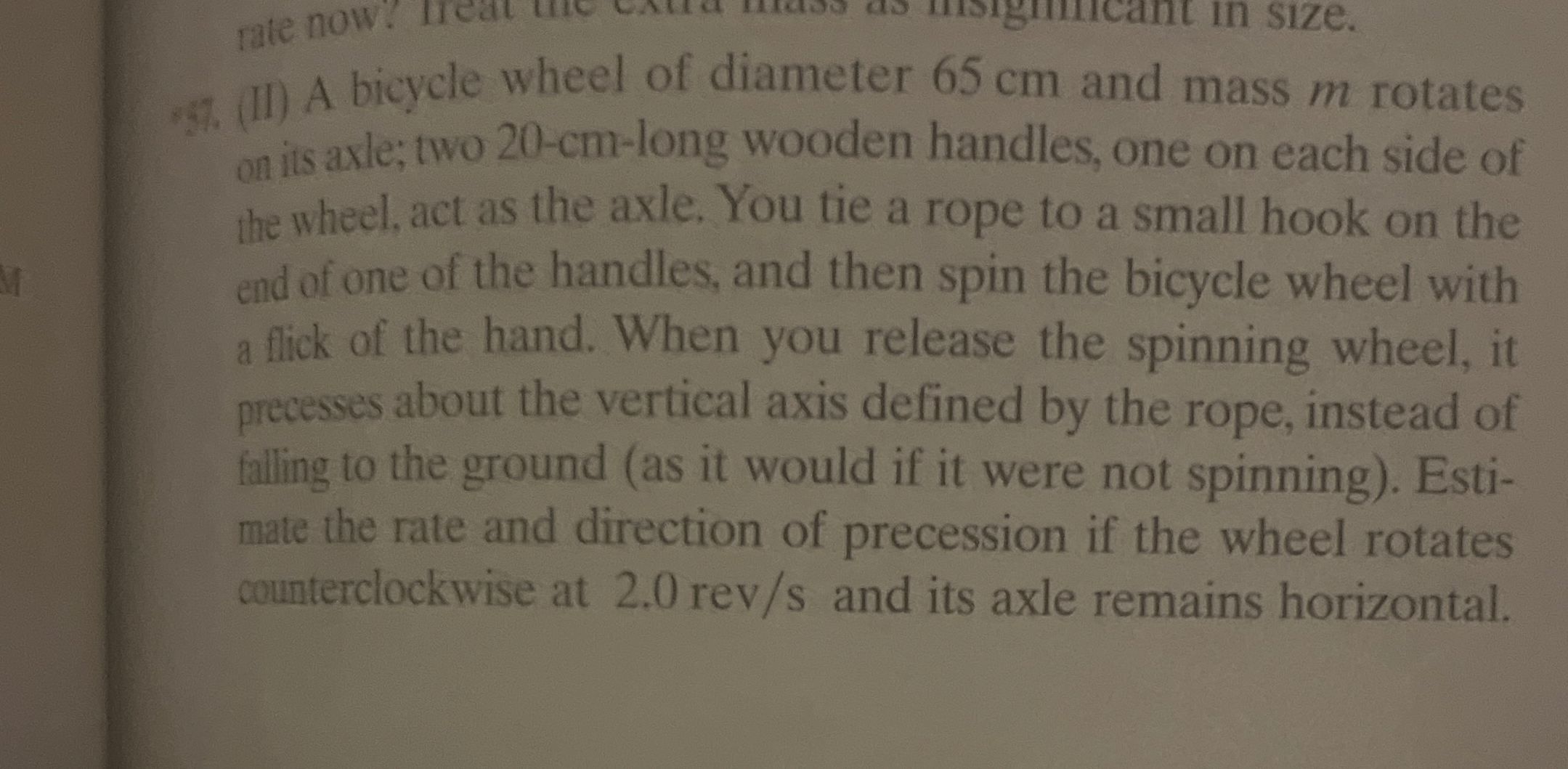 ( II ) A bicycle wheel of diameter 6 5 cm and