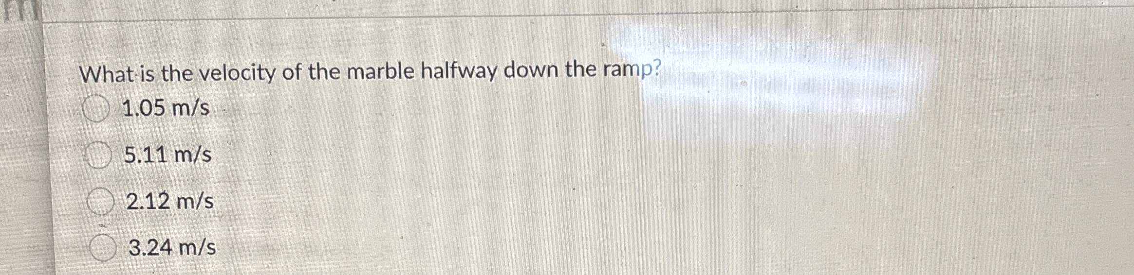 What is the velocity of the marble halfway down
