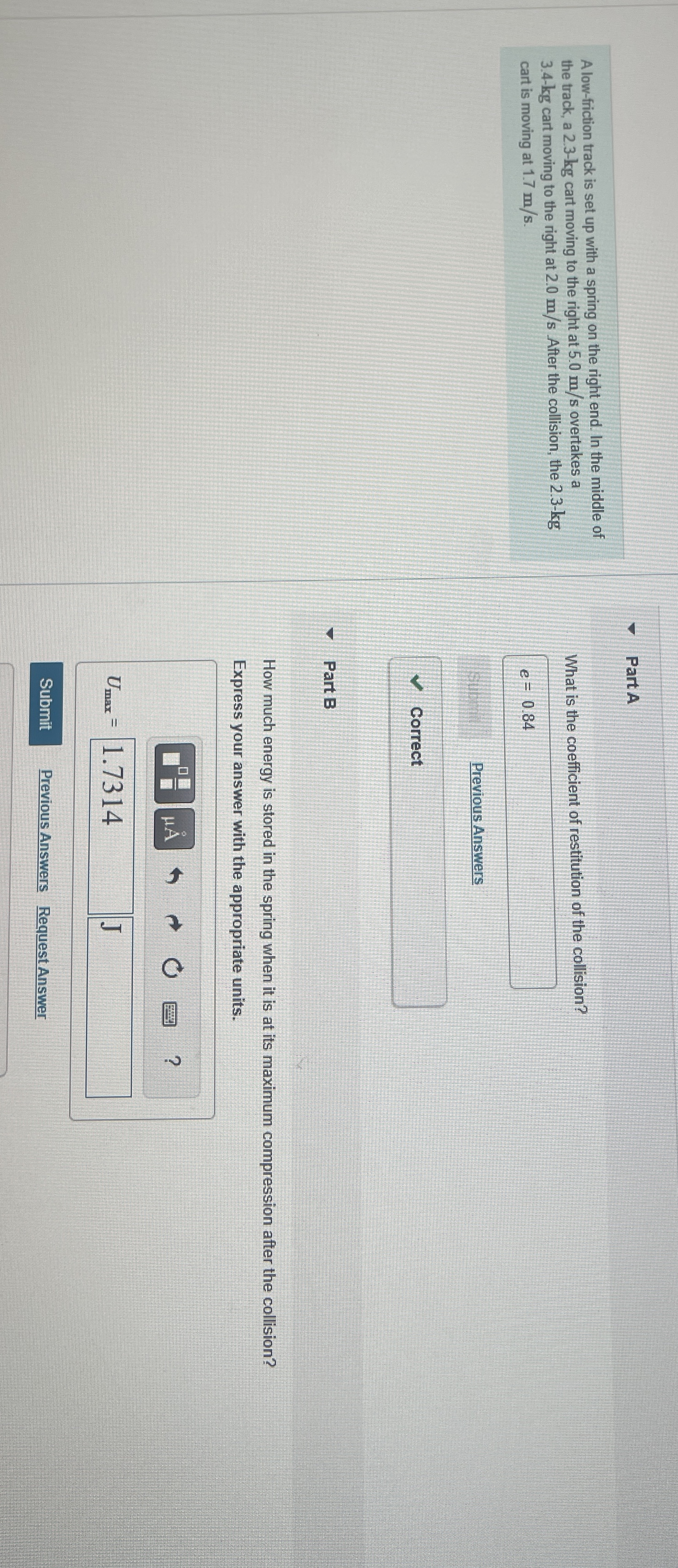 A low - friction track is set up with a spring on