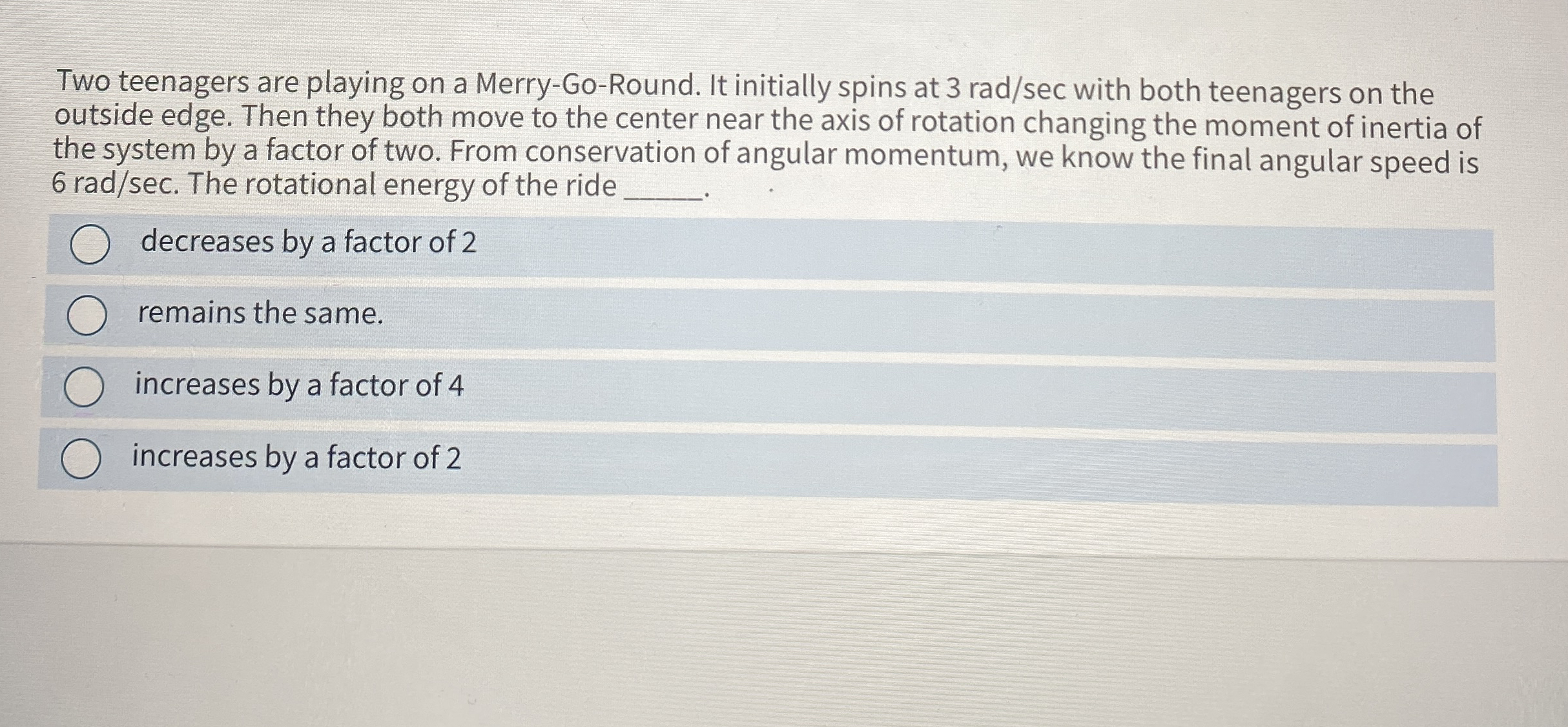 Two teenagers are playing on a Merry - Go -