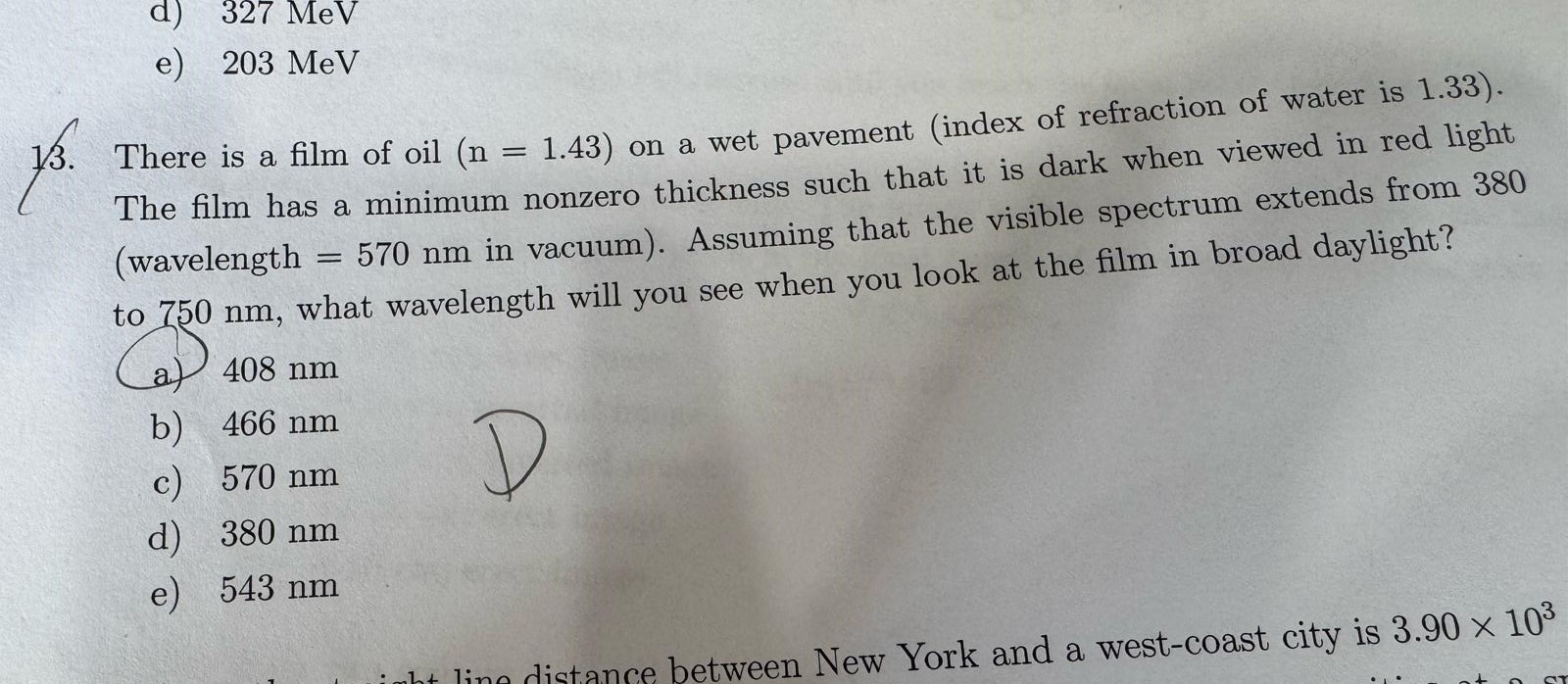 There is a film of oil ( n = 1 . 4 3 ) on a wet
