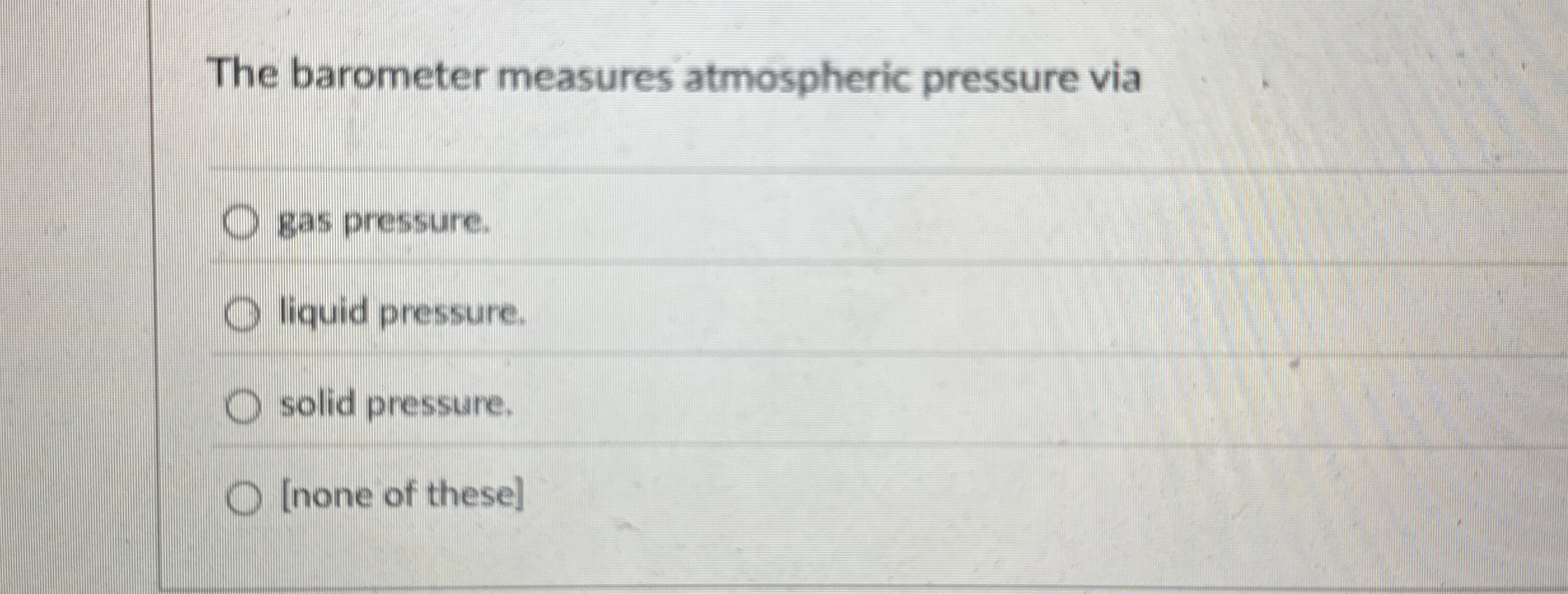 The barometer measures atmospheric pressure via