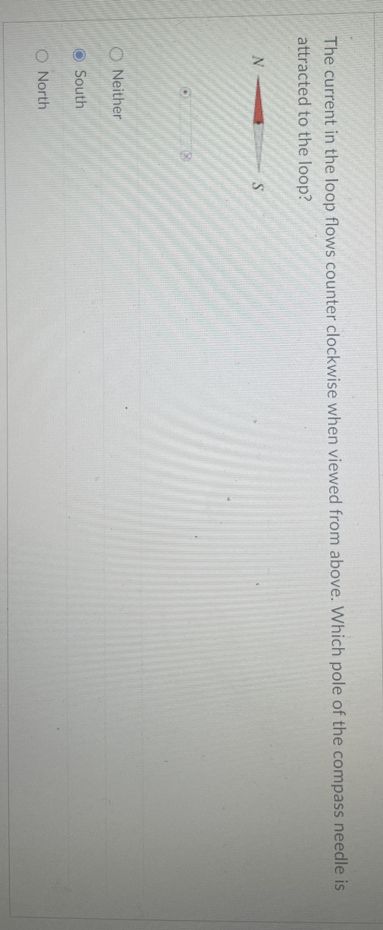 The current in the loop flows counter clockwise