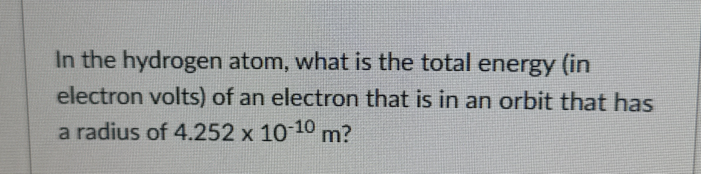 In the hydrogen atom, what is the total energy (