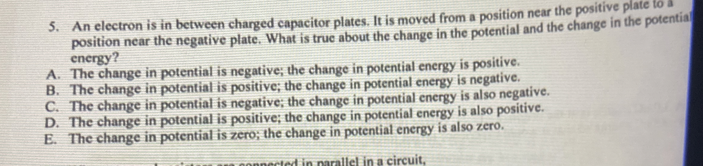 An electron is in between charged capacitor